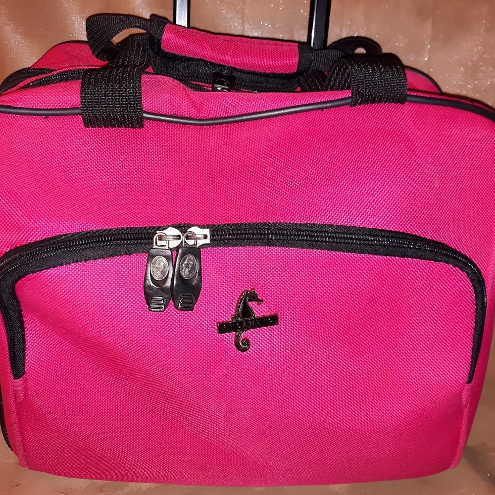 ATLANTIC HOT PINK ROLLING LUGGAGE CARRYON